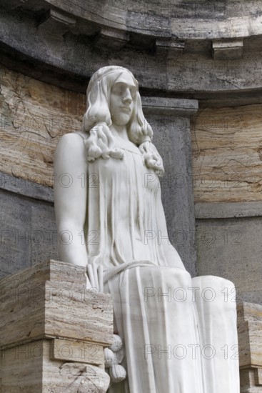 Seated marble female figure by sculptor Karl Janssen, burial place of the Henkel family of industrialists, Nordfriedhof Düsseldorf, North Rhine-Westphalia, Germany