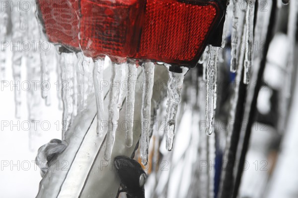 Bicycle icy due to freezing rain, icicles, detailed view
