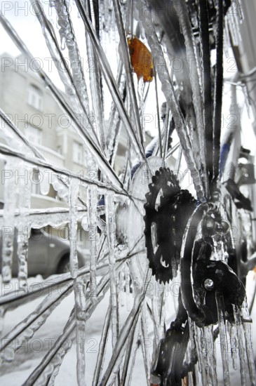 Bicycle icy due to freezing rain, icicles, detailed view