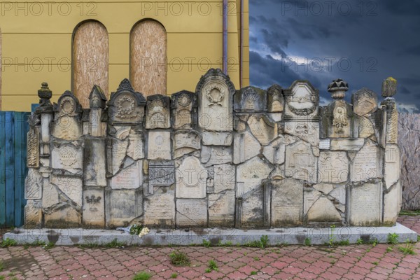 Wall of Memory, constructing fragments of destroyed tombstones, Jewish cemetery, since 1866, Chernivtsi, Bukovina, Ukraine