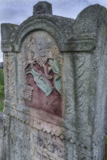 Old tombstone with colored Levite pot, Jewish Cemetery, Czernowicz, Bukovina, Ukraine