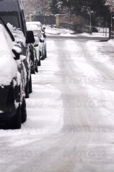 Cars parked in winter in snow, Germany