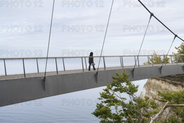 Single person on the skywalk, viewing platform at the Königsstuhl National Park Center, view of the chalk cliffs and Baltic Sea, Jasmund National Park, Sassnitz, Rügen island, Baltic Sea, Mecklenburg-Western Pomerania, Germany