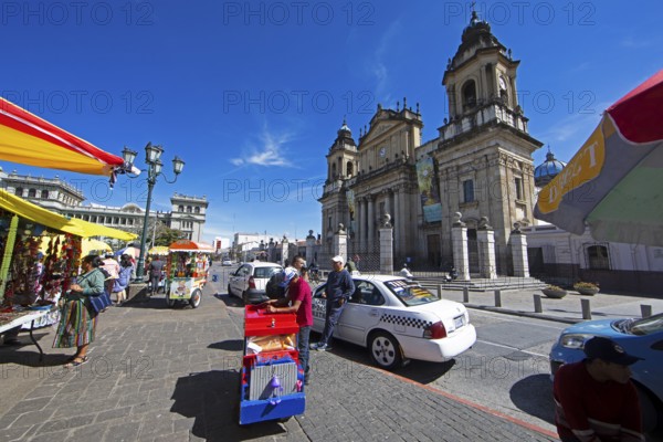 Street scene in the old town zone 1, in the back the cathedral or Catedral Metropolitana de Santiago de Guatemala, Guatemala City, Guatemala Department