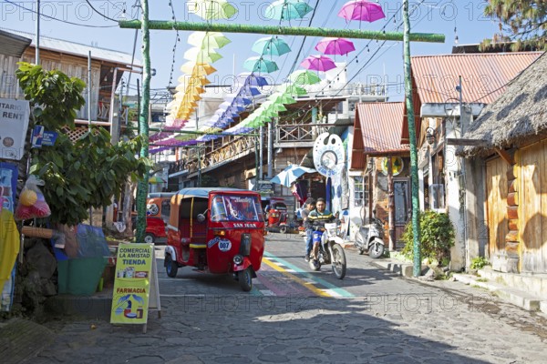 Colorful alley in San Juan la Laguna, Atitlán, Sololá Department, Guatemala