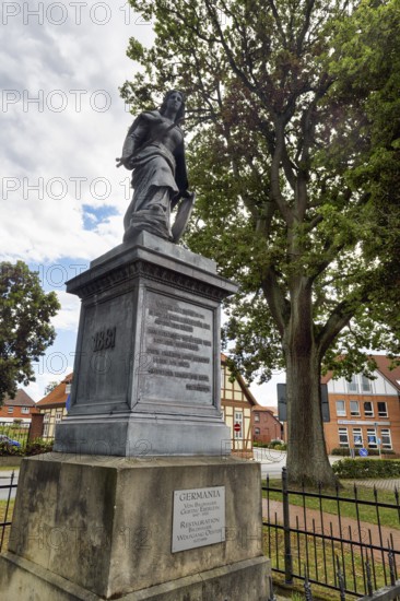 Restored Germania monument, Germania statue with sword, base with inscription, symbol, German unity, sculptor Gustav Eberle, Neuhaus, Neuhaus district, Lower Saxony Elbe floodplain biosphere reserve, Lower Saxony, Germany