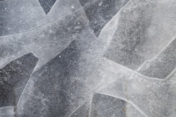 Ice sheets form abstract pattern on a frozen lake, ice, winter, Finland