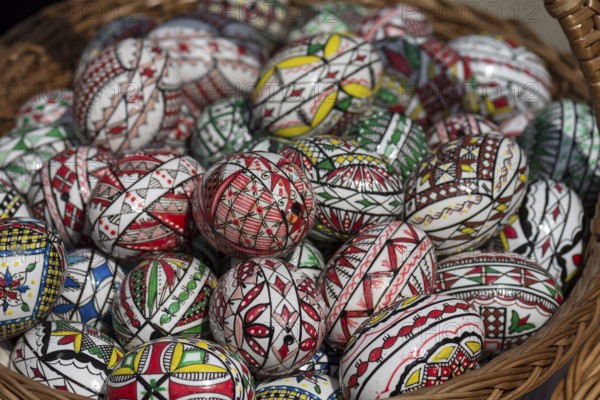 Colourfully painted eggs as a souvenir in front of Voronet Monastery, Buckovina, Romania