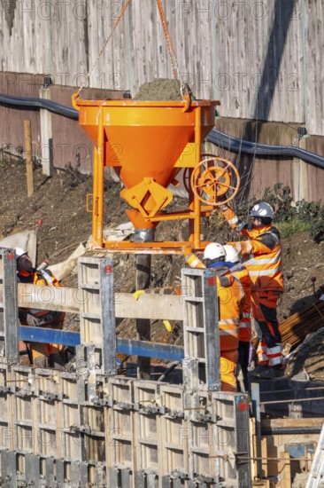 Construction work on a concrete retaining wall at the Duisburg-Kaiserberg motorway junction, on the A3, North Rhine-Westphalia, Germany