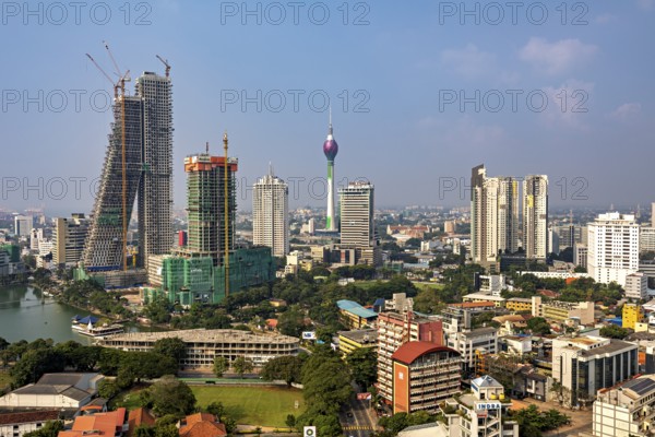 Architectural skyline with television tower and skyscrapers under a blue sky, the skyline of Colombo in Sri Lanka