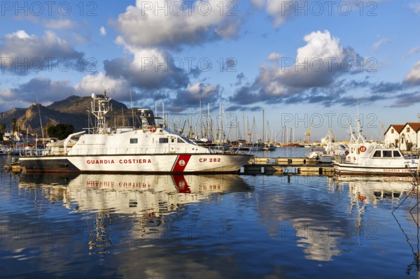 Italian Coast Guard patrol boat CP 282, sailboats, coastal landscape, marina, Marina La Cala in the evening light, Palermo, Sicily, Italy