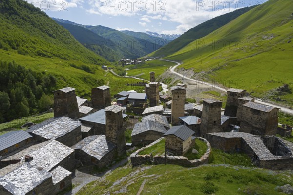 Village with a variety of towers and roofs in a green mountain backdrop, defensive towers, Ushguli, Ushguli, Chazhashi district, Mingrelia region and Upper Svaneti, Svaneti, Georgia