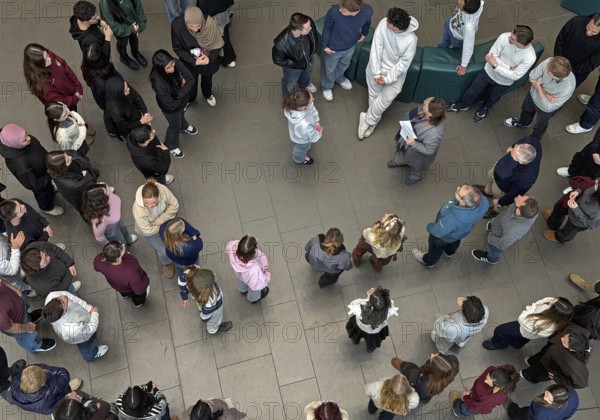 View from above of a group of people in the House of History, Bonn, North Rhine-Westphalia, Germany