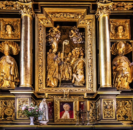 Side altar with portrait of Pope John Paul II, St. Mary's Church, 14th century, Krakow, Poland