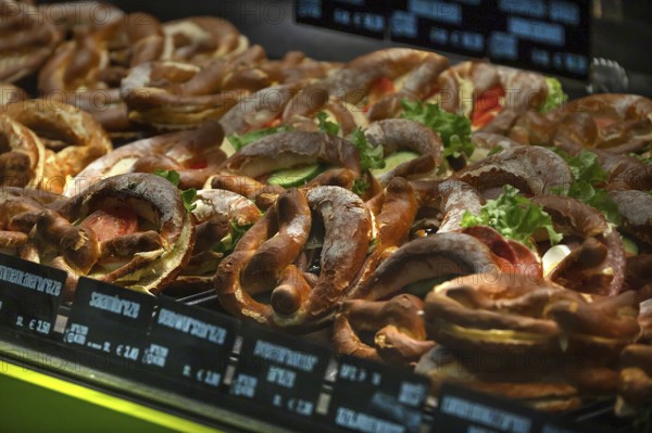 Ready butter pretzels on display at the train station, Nuremberg, Middle Franconia, Bavaria, Germany