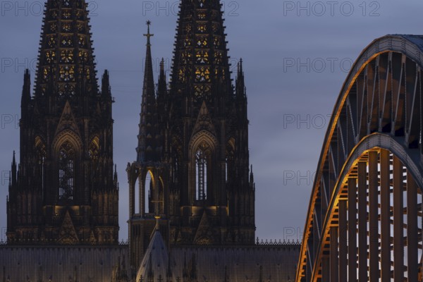 Evening atmosphere, Cologne Cathedral illuminated with LED lamps and the Hohenzollern Bridge, Cologne, North Rhine-Westphalia, Germany