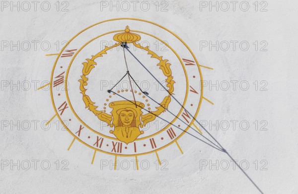 Sundial on a façade in St. Marienthal Abbey on the Neisse, Ostritz, Saxony, Germany