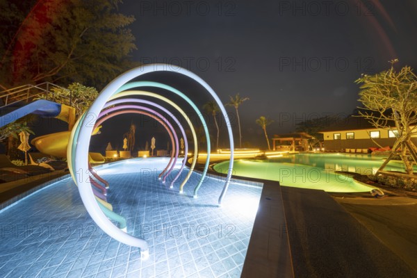 Illuminated swimming pool on Koh Chang Island, Andaman Sea, Southern Thailand, Thailand