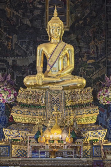 Golden Buddha statue, Bhumispara mudra, Buddha Gautama at the moment of enlightenment, Wat Worawihan, Wat Prayurawongsawas Worawihan, Bangkok, Thailand