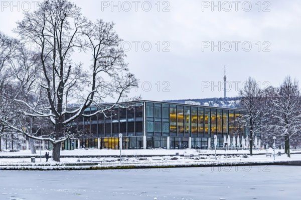 Exterior view of the state parliament building with Eckensee and television tower. Winter in Stuttgart. The city is wintry white early in the morning. Stuttgart, Baden-Württemberg, Germany