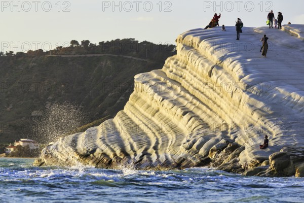 Terraced chalk cliffs Scala dei Turchi, walkers on Turkish steps, Realmonte, Agrigento, Sicily, south coast, Mediterranean Sea, Italy