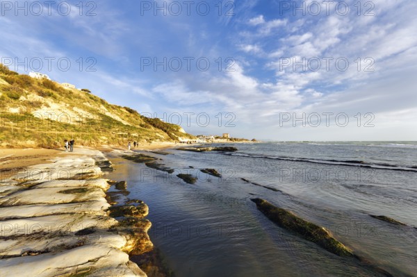 Walkers on the beach, Lido Scala dei Turchi, Realmonte, Agrigento, Sicily, south coast, Mediterranean Sea, Italy