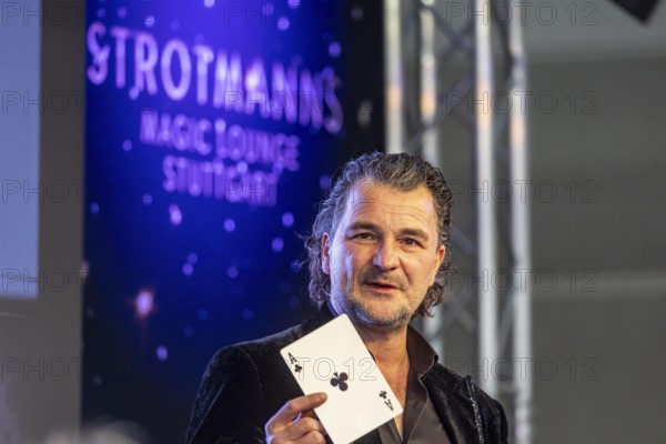 Magician Thorsten Strotmann during a presentation during the CMT trade fair. portrait. Stuttgart, Baden-Württemberg, Germany