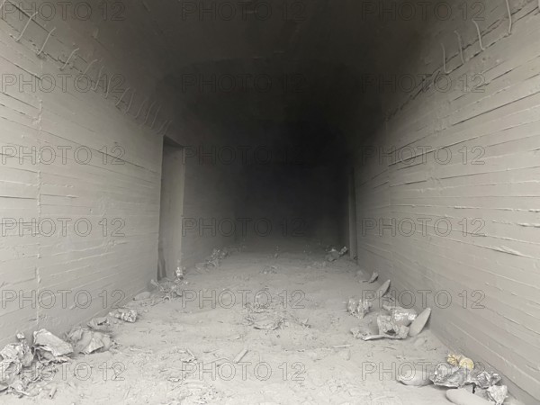 In Sarrin, Aleppo province, on January 27, 2026, footage captures an extensive subterranean network discovered following the withdrawal of Kurdish SDF fighters. The Syrian Army's clearing operations in the district near Ayn al-Arab revealed reinforced tunnels designed for vehicle transport, alongside abandoned military equipment and large quantities of unexploded ordnance, Aleppo, Ayn al-Arab, Syria