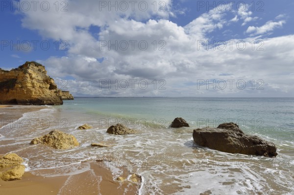 Rocky coast and beach, Praia do Pinhao, Lagos, Algarve, Portugal