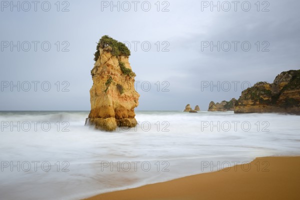 Rocks on the coast in the surf, Praia Dona Ana, Lagos, Algarve, Portugal