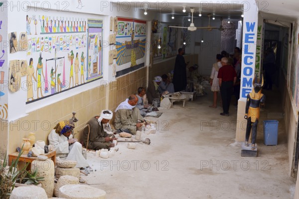 Workers and tourists in an alabaster factory, Luxor, Egypt