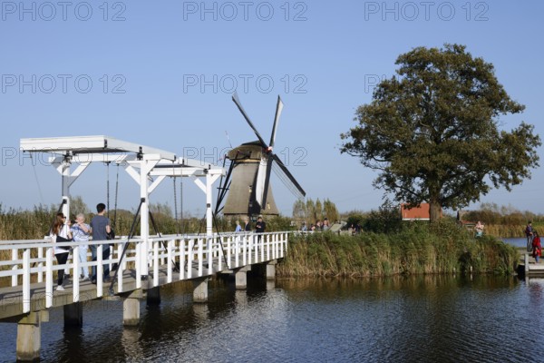 Historic windmill and drawbridge, UNESCO World Heritage Site, Kinderdijk, South Holland, Netherlands