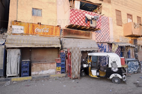 Shops and tuk-tuk, Esna, Egypt