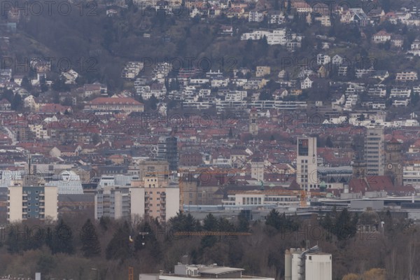 30.03.2018: Zoomed view of city roofs, towers and industrial buildings. Stuttgart, Baden-Wuerttemberg, Germany