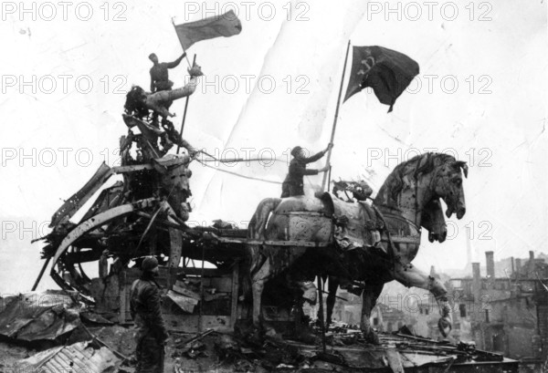 J. Chaldej arrived in Berlin with three Soviet flags. The second flag was raised at the Brandenburg Gate. May 2, 1945, Berlin, Germany