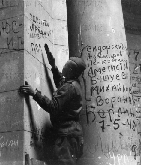 Inscription, graffiti, a Red Army man writes his name on the wall at the Reichstag, early May 1945, Berlin, Germany