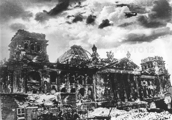 The Reichstag after Allied bombing, end of April 1945 Berlin, Germany Immediately after the end of the Second World War, the last heavily contested Reichstag building stood as a partial ruin in an area marked by rubble. The open spaces around were used by the starving population as plots for growing potatoes and vegetables. On November 22, 1954, the dome was blown up — due to alleged static uncertainty and to relieve the load on the damaged building