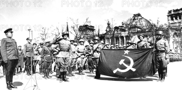 May 20, 1945, City Commander Bersarin addresses the Reichstag on the occasion of the ceremonial handing over of the flag of the 5th Stoß Regiment, which was the first to storm the Reichstag and raise the flag. The flag was brought to Moscow and is in the military museum there. Berlin, Germany This is not the flag that J. Chaldej raised on the Reichstag back then