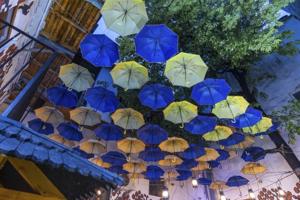 Umbrellas as decoration in a courtyard of a restaurant, Czernowicz, Ukraine