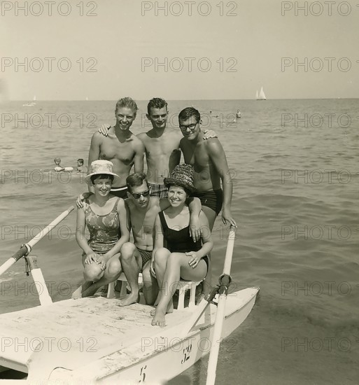 Historical photo summer 1961, tourists, beach, Rimini, Italy