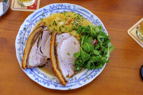 Roast pork with potato salad, Erlebnisgaststätte Erlensee, near Schechen, Upper Bavaria, Bavaria, Germany