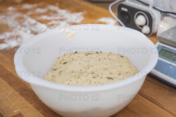 A bowl of risen dough on a wooden table, baking rolls, Haselstaller Hof, Gechingen, Germany