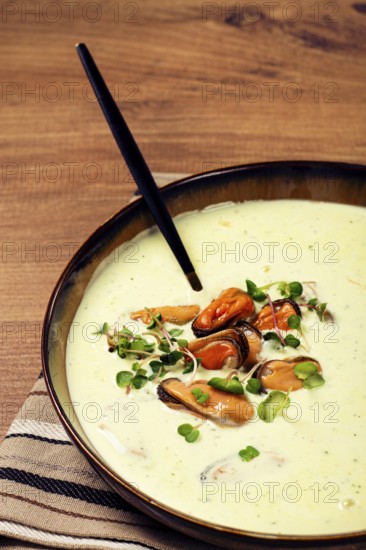 Creamy soup with mussels, mussels without shells, American cuisine, homemade, no people