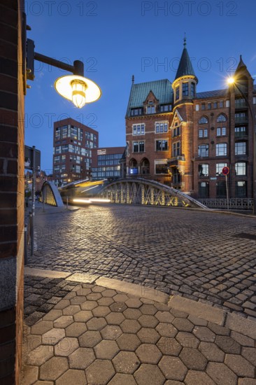 Road traffic in Speicherstadt at blue hour, Hamburg, Germany