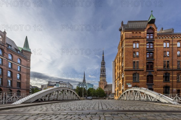 Bridge overlooking St. Katharinen's main church at the blue hour, Speicherstadt, Hamburg, Germany
