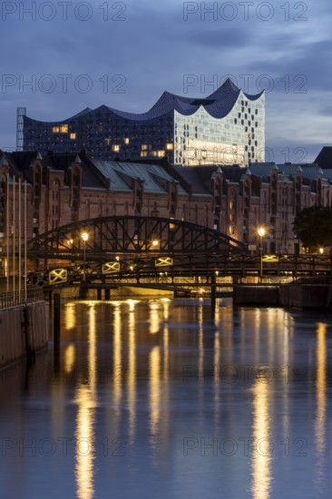 View from Speicherstadt to the Elbe Philharmonic Hall at the blue hour, Hamburg, Germany