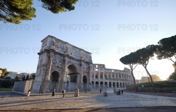 Arch of Constantine and Colosseum at sunrise, Rome, Lazio, Italy