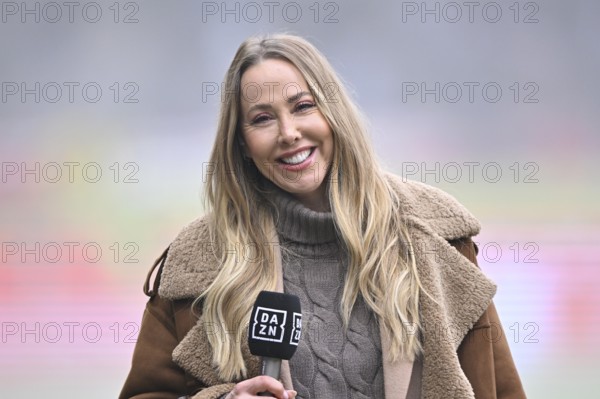 DAZN presenter interviewed microphone micro logo smiling portrait soccer Bundesliga, Voith-Arena, Heidenheim, Baden-Württemberg, Germany