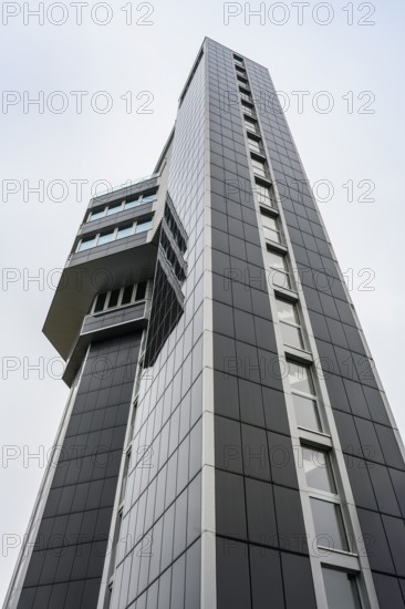 Modern architecture, geometric lines, former water tower of the Radolfzell dairy plant, converted into the Hotel Aqua-Turm since 2017. The world's first zero-energy passive high-rise building, the entire façade consists of around 1000 photovoltaic modules and uses solar thermal energy wind power and hydrothermal energy to produce more energy than it consumes, Konstanz district, Baden-Württemberg, Germany