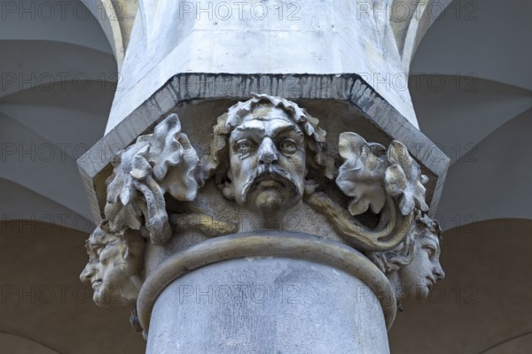 Reliefs on the pillars of the arcades of the Cloth Hall, Krakow, Poland